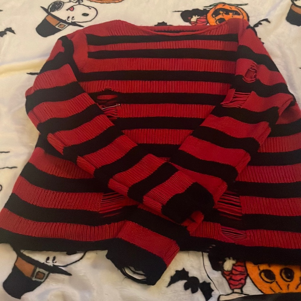 Red and black knitted sweater